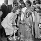 Four-year-old Prem, whose name means “Love” in Hindi, applies a spot of dry colored powder to the forehead of First Lady Rosalynn Carter at a boarding school in New Delhi on Monday, Jan. 2, 1978. The ceremony, called Tilak, is a sign of friendship and respect. Mrs. Carter visited the Navayug School while the President met with Indian leaders.